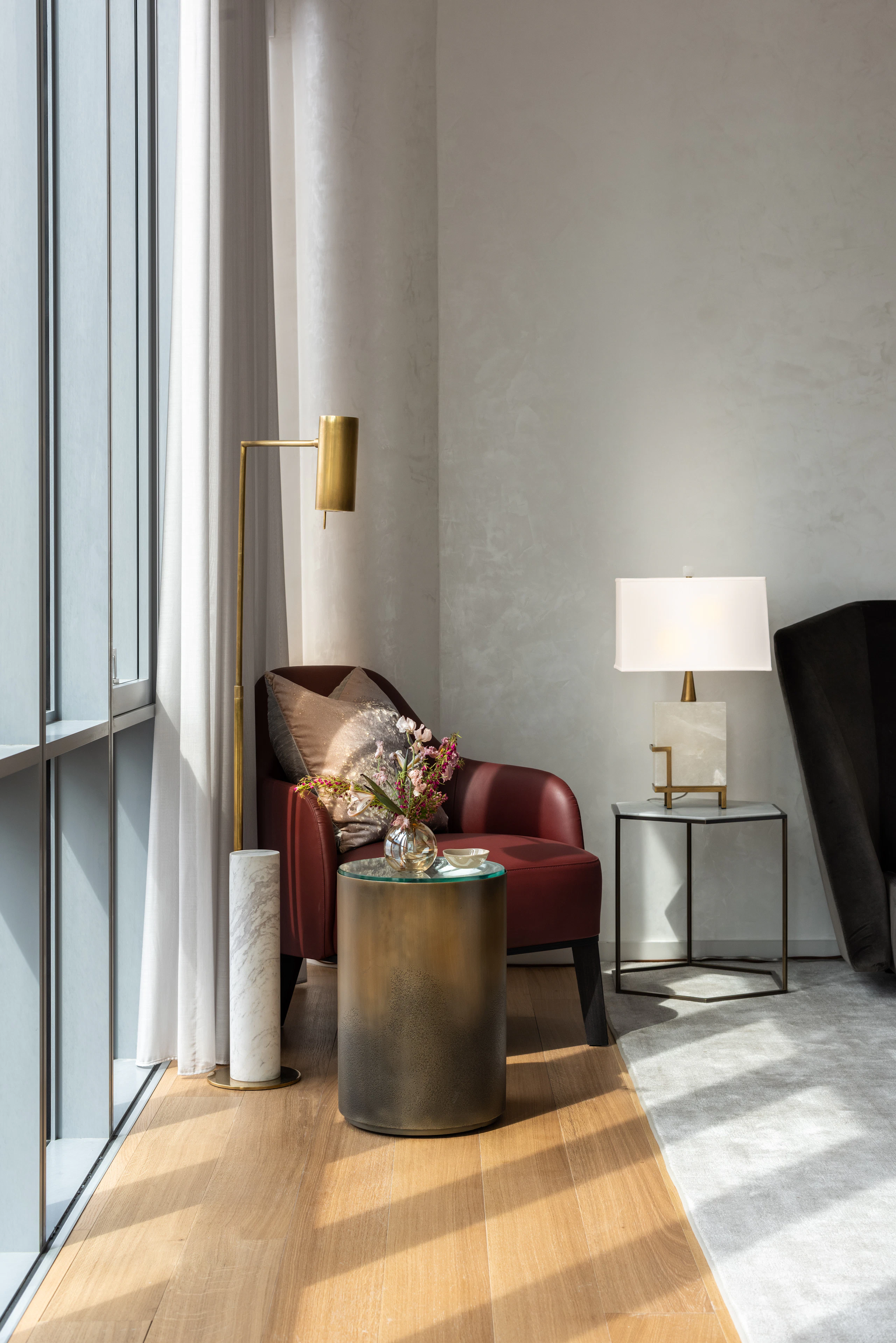 red leather armchair and reading lamp