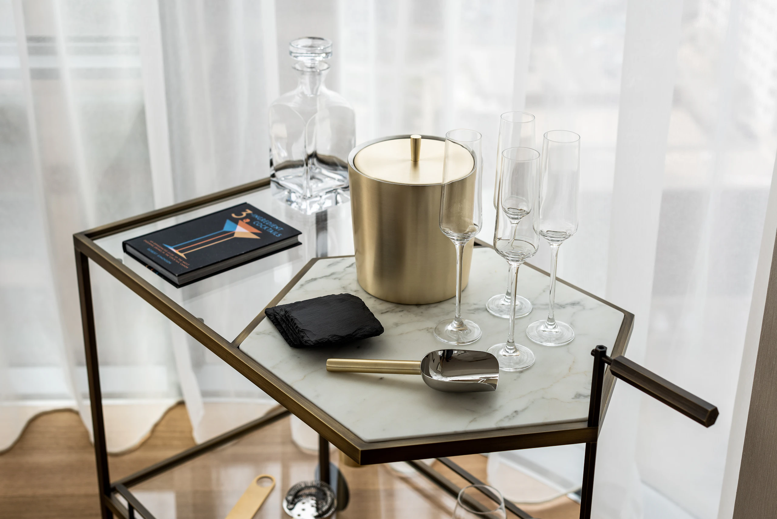 cocktail table, ice bucket and glasses