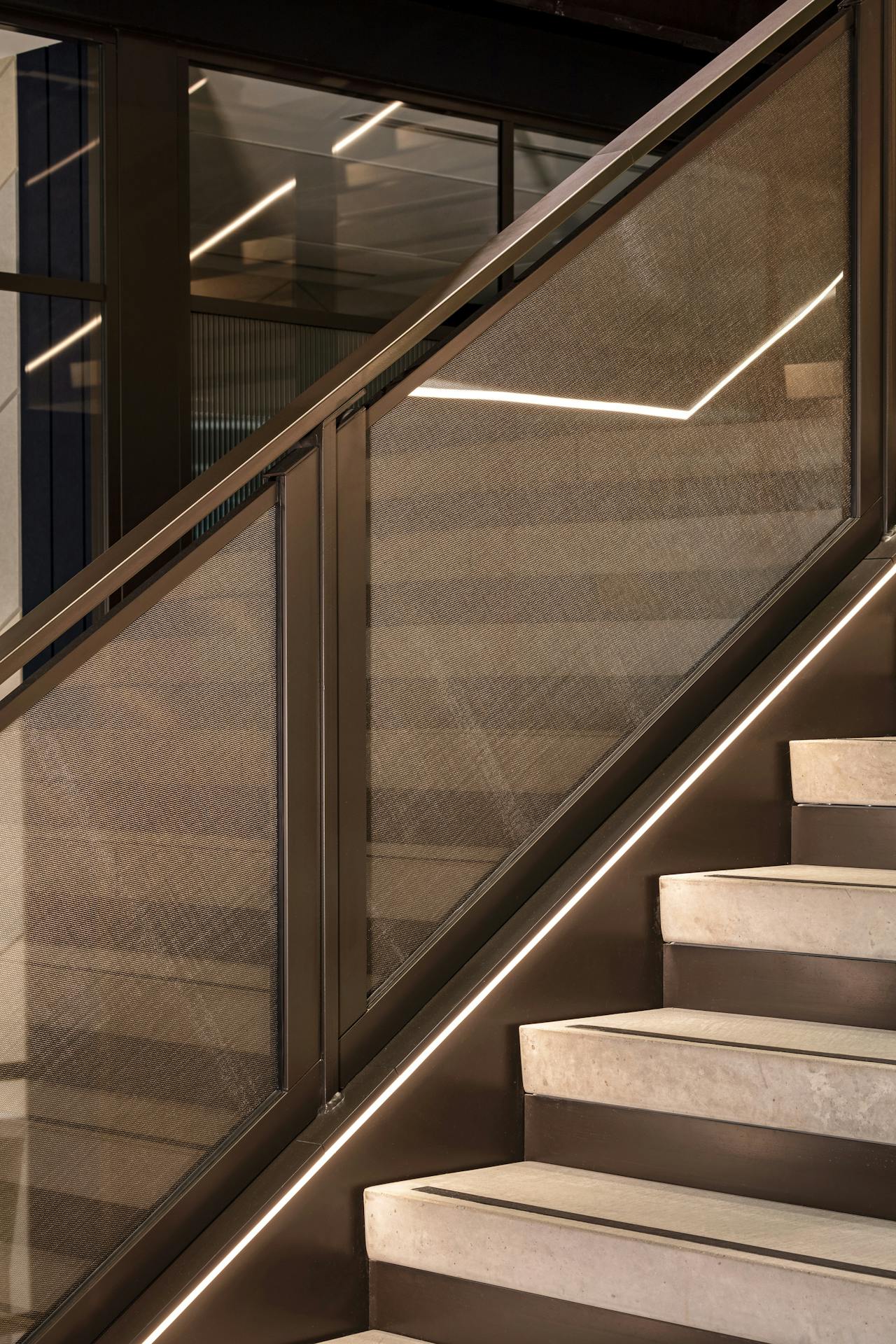 mondrian bronze & glass mesh lighting stairwell detail design