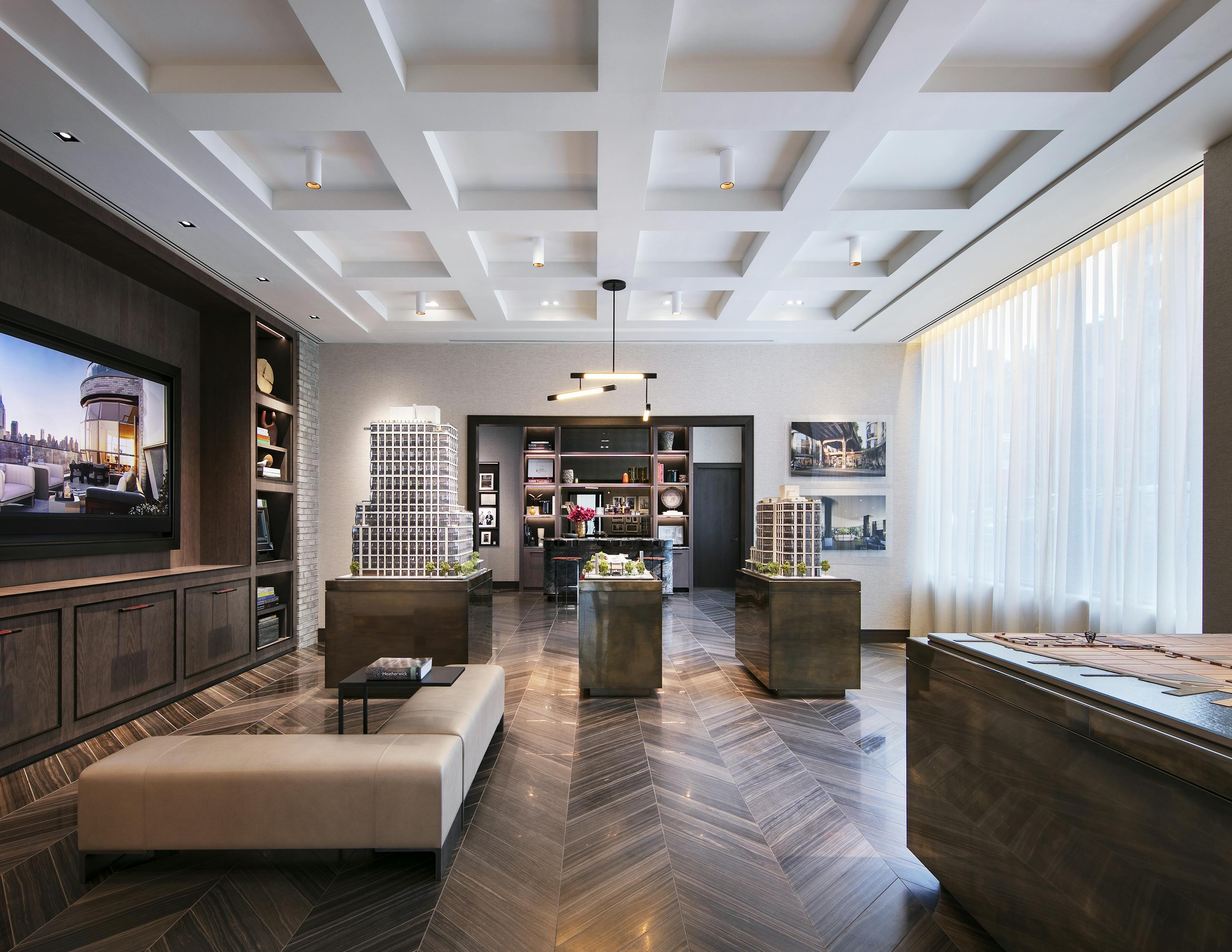 contemporary coffered ceiling and chevron stone floor interior building amenities