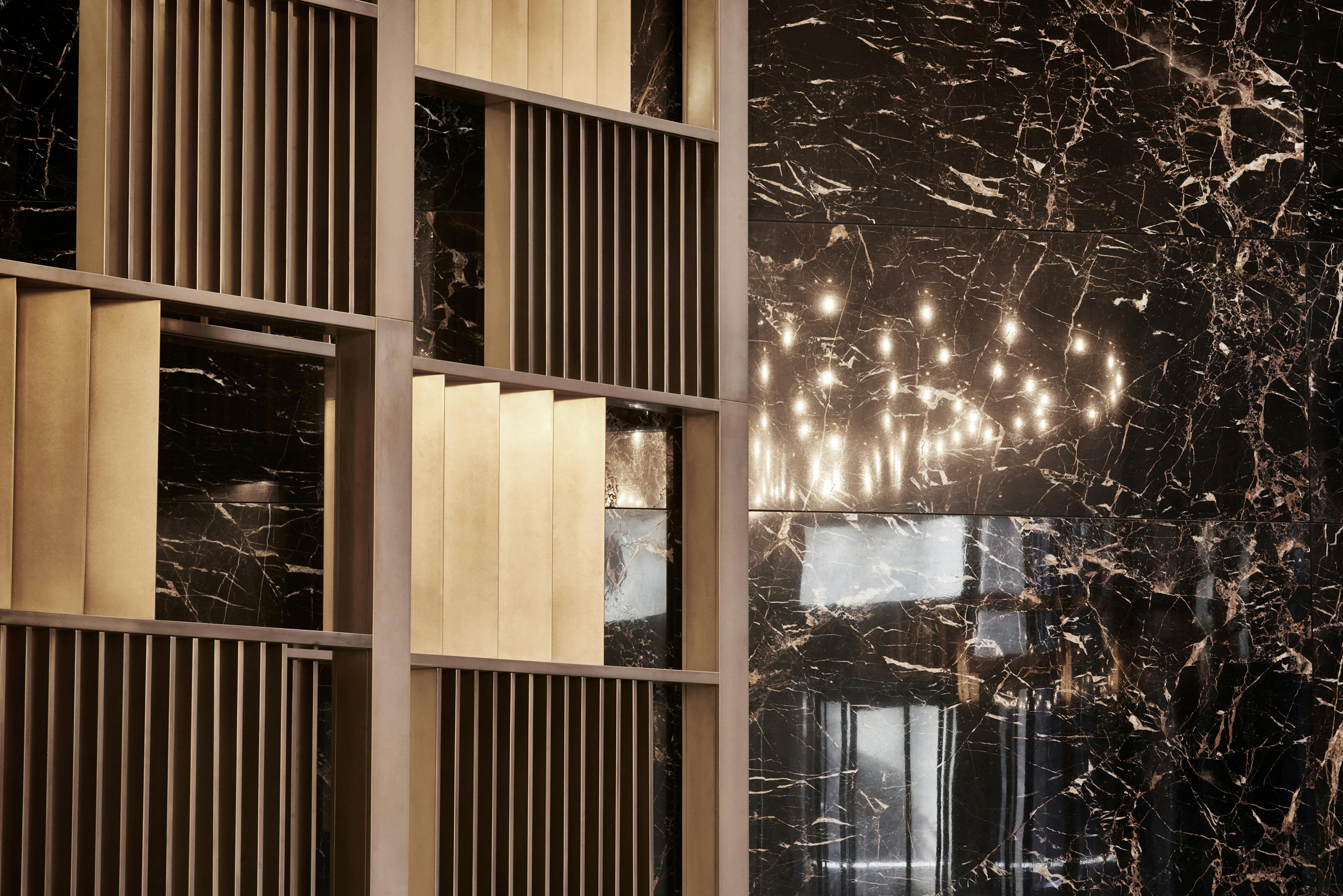 modern screens complementing traditional textures in lobby