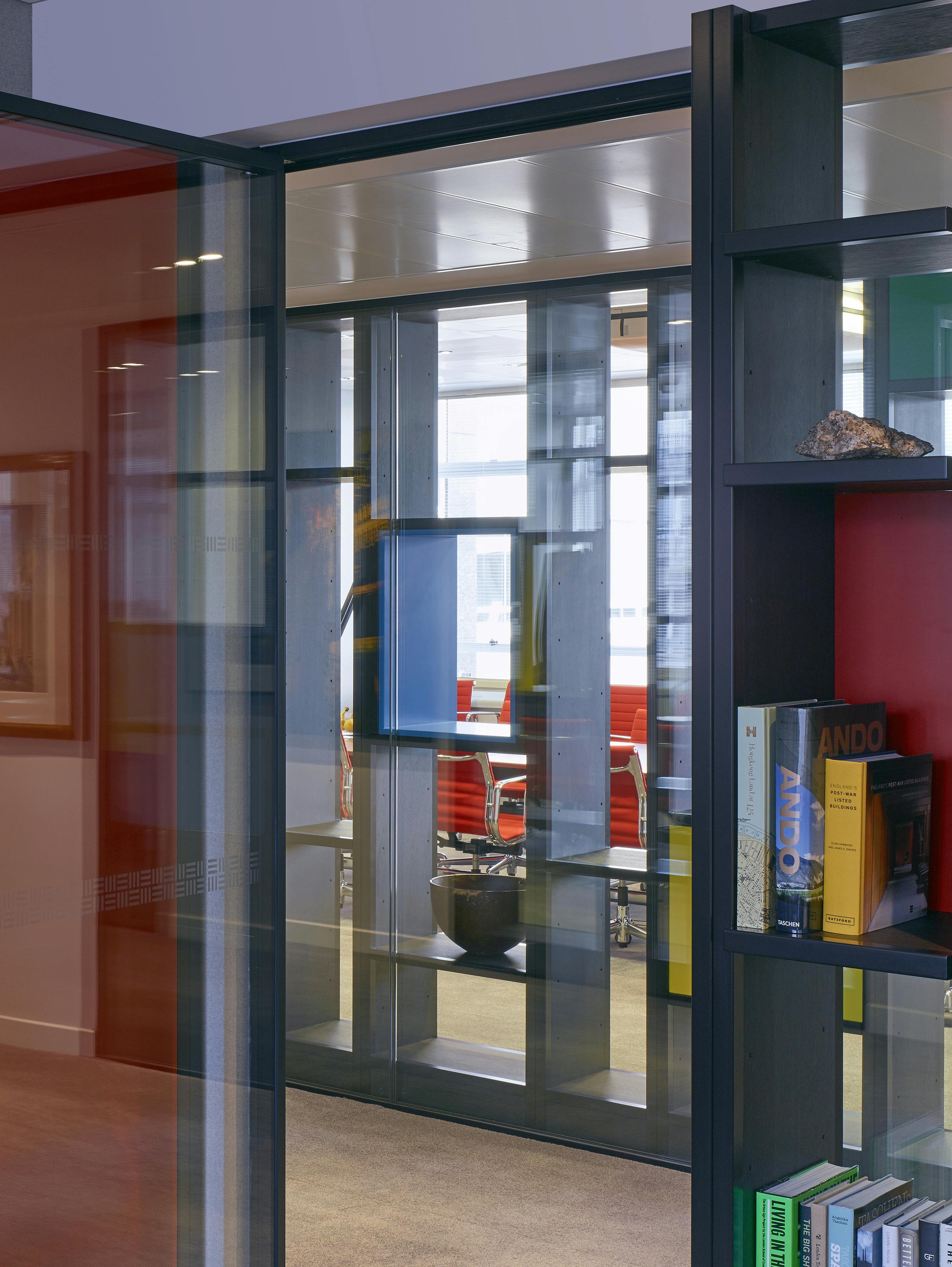 red office chairs in meeting room