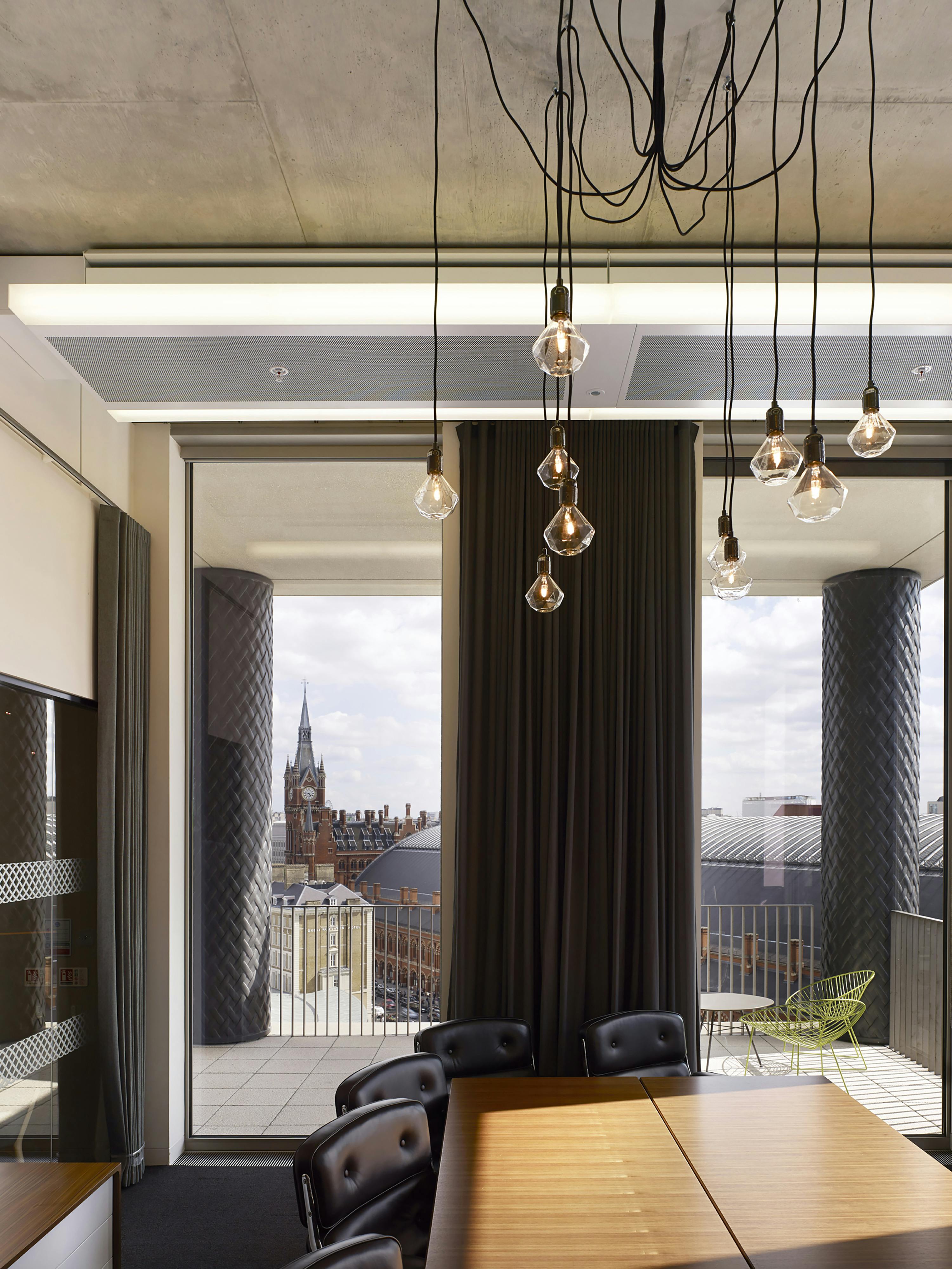 office pendant lighting in a creative modern workspace