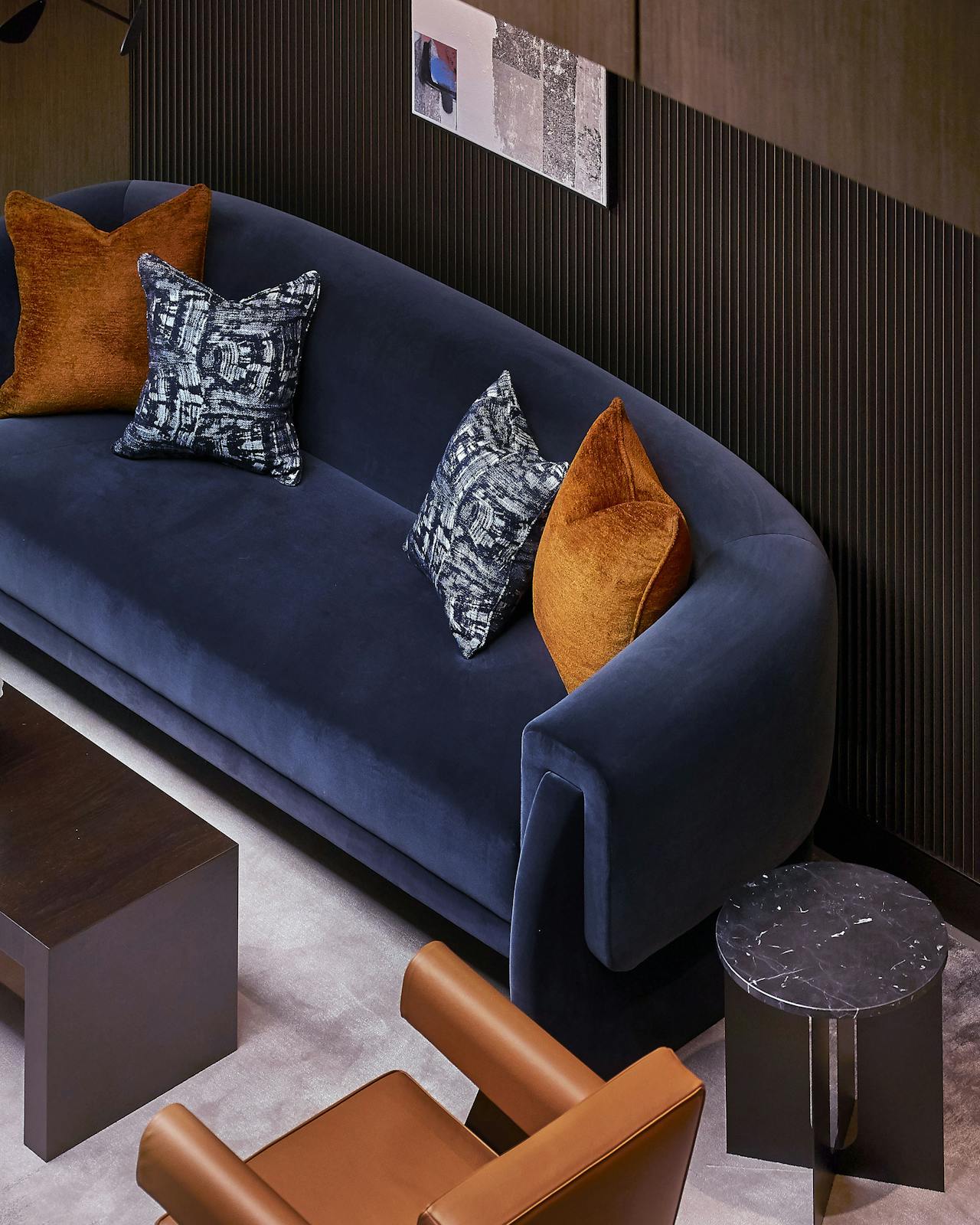 warm fabrics used in this comfortable sofa & its cushions