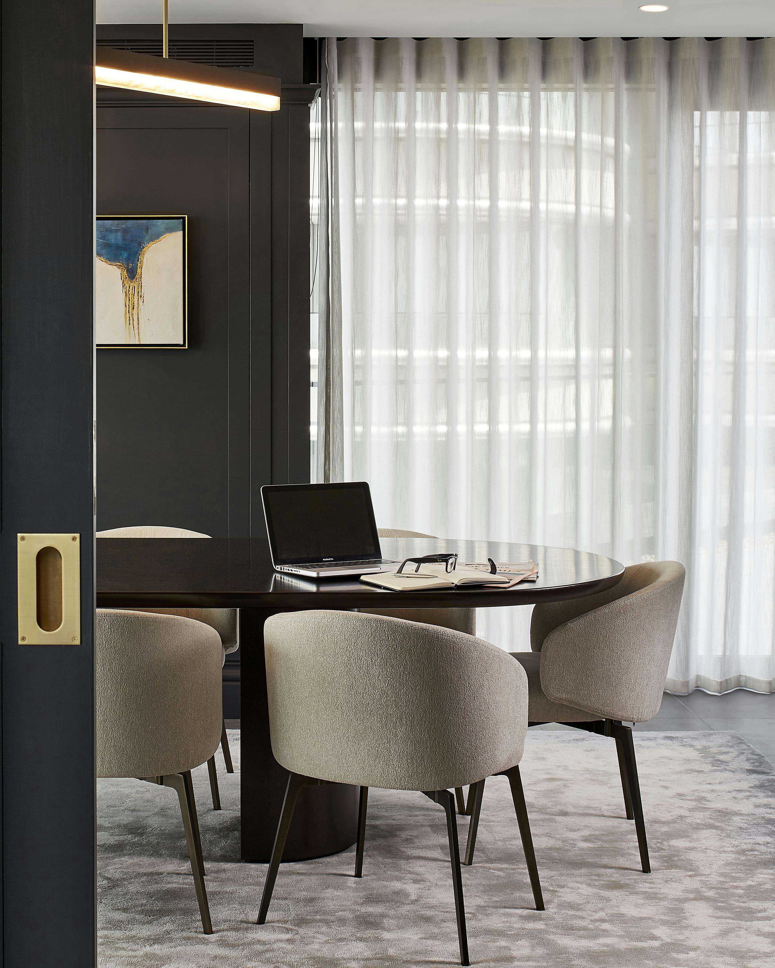 round glass top table & luxury office chairs